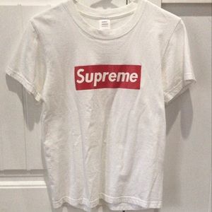 White tee shirt with supreme logo printed on